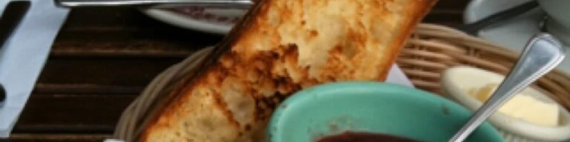 Toasted baguette, jam, butter and coffee - Petit déjeuner des champions.