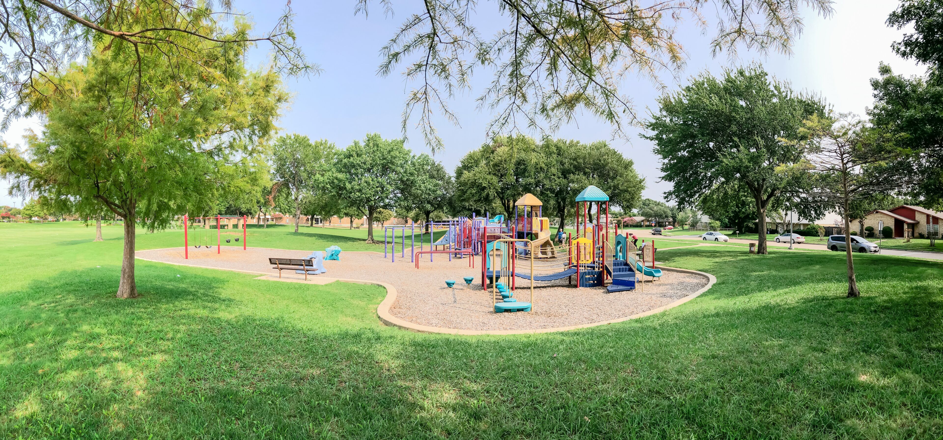 Panoramic view colorful playground near residential neighborhood in Richardson, Texas, USA