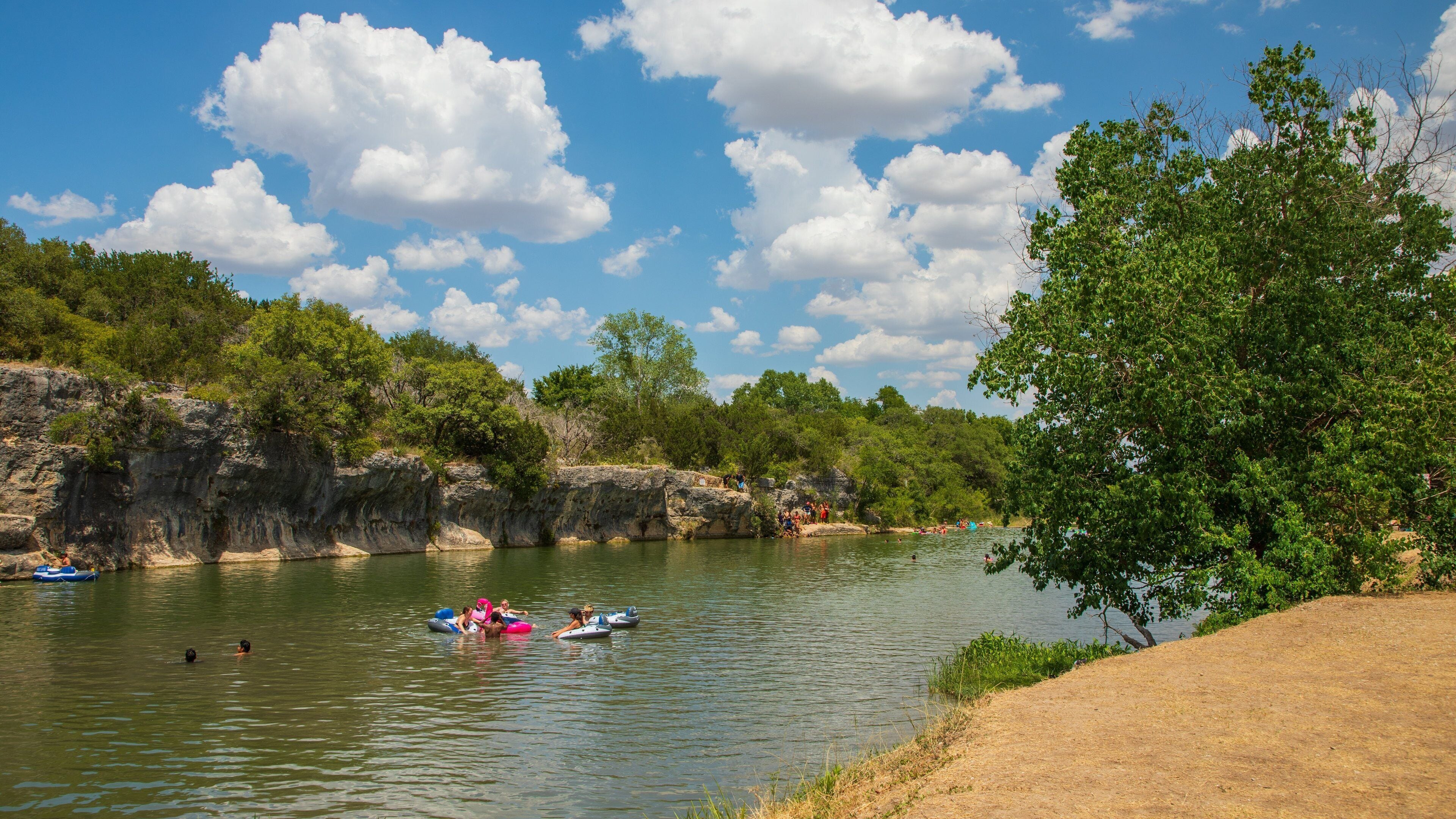 Georgetown which includes a lake or waterhole and swimming