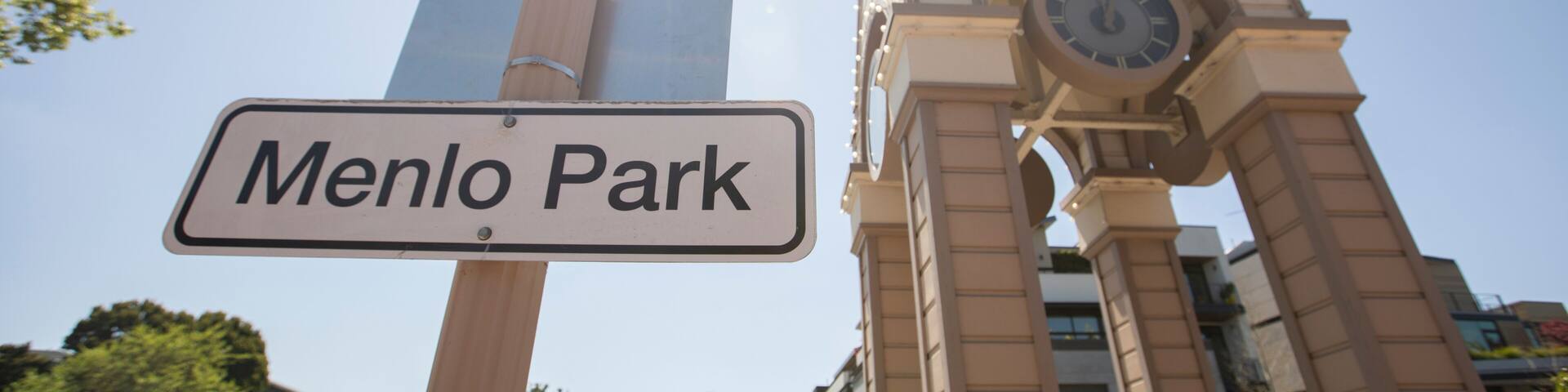 Afternoon view of the historic wooden clock tower in downtown Menlo Park, California, USA.