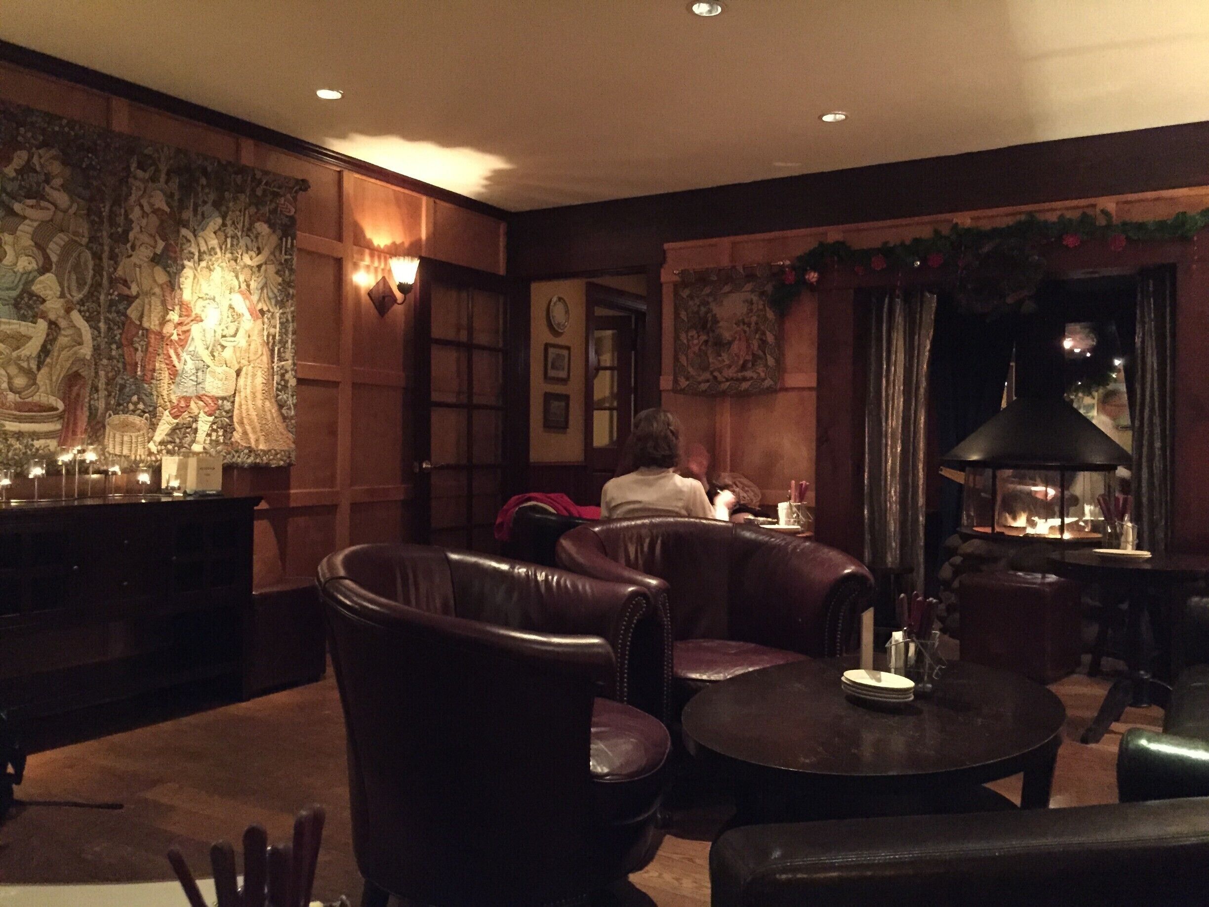 I've been having quiet meetings over drinks and finger food for years in the area and never found this place.  It's a little hidden gem.  Comfy chairs.  Fire.  Tapas.  A great manhattan or sangria.  Thumbs up.