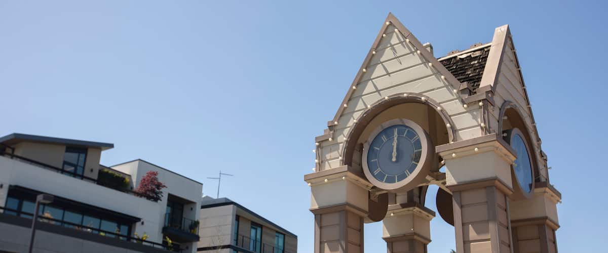 Afternoon view of the historic wooden clock tower in downtown Menlo Park, California, USA.