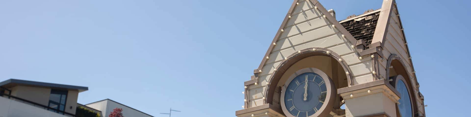 Afternoon view of the historic wooden clock tower in downtown Menlo Park, California, USA.
