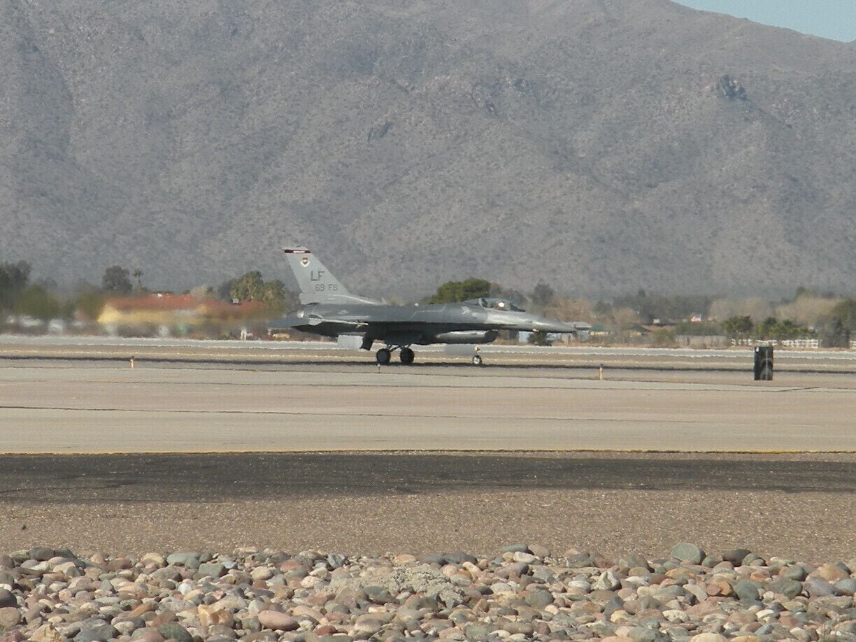 An F-16 taking off at Luke Air Force Base.  Was fortunate to have a friend who is a pilot take me there to get up close to this. You can see the flames from the thrust of the takeoff.  The power is amazing