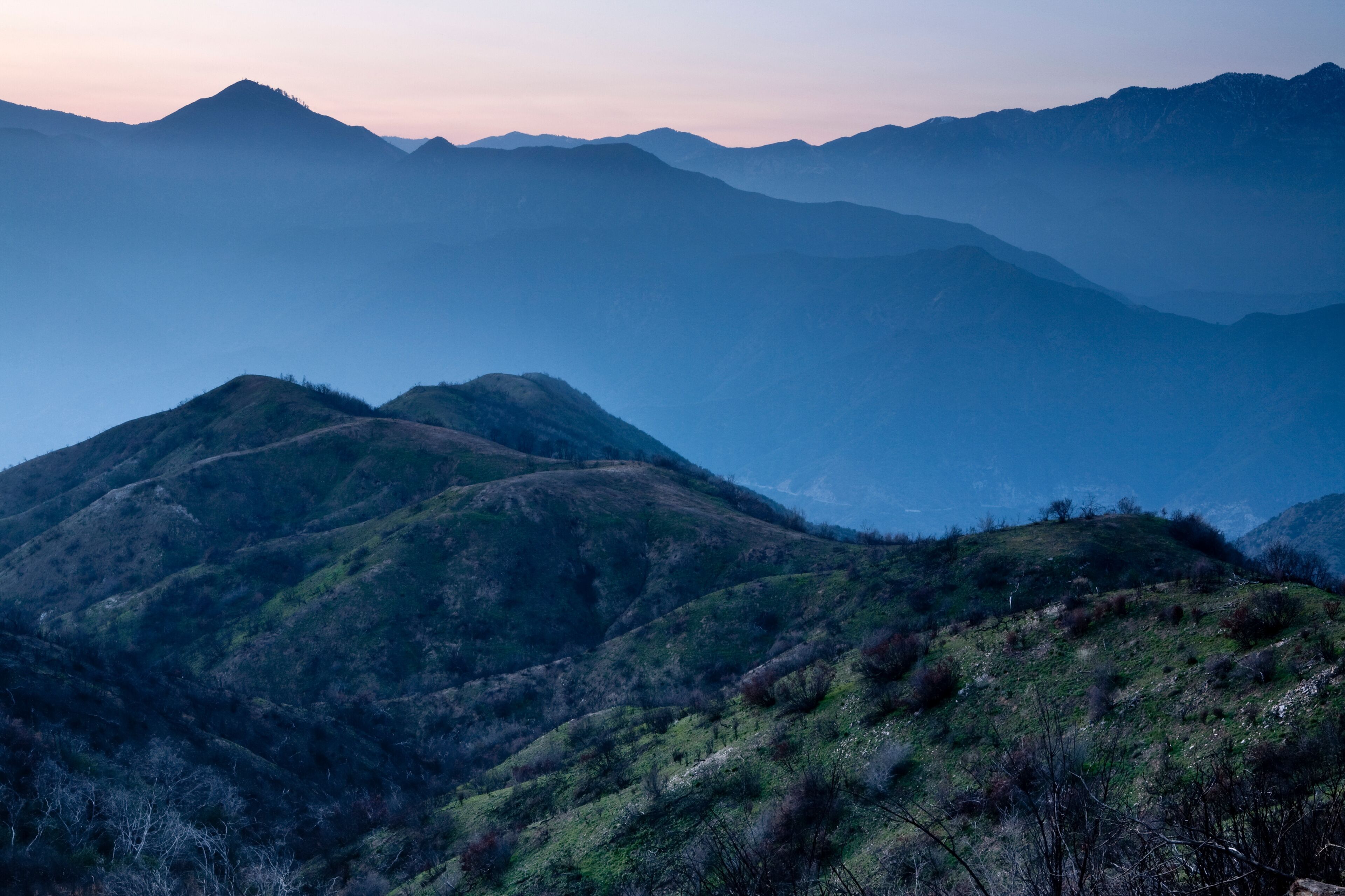 Sunset over the Angeles National Forest looking out from Glendora Mountain Road towards Glendora, California.