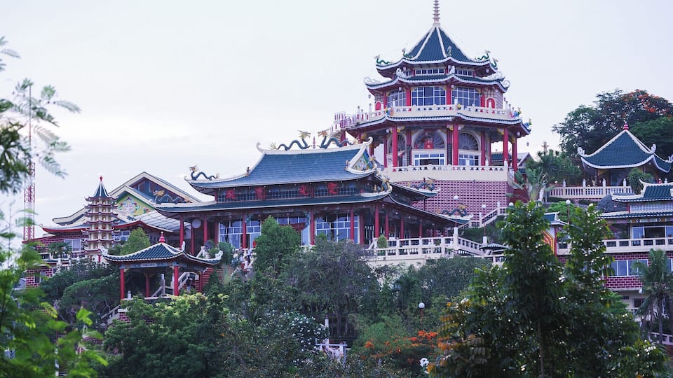 Open to the worshipers and non-worshipers alike, this temple is a towering, multi-tiered, multi-hued attraction accessible by three separate winding routes, and built by Cebu's Chinese community. #roadtrip
