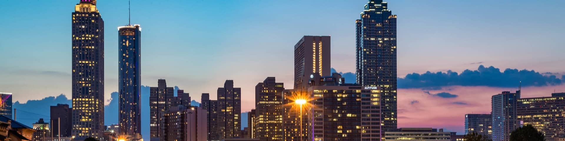 Downtown Atlanta which includes landscape views, night scenes and a sunset