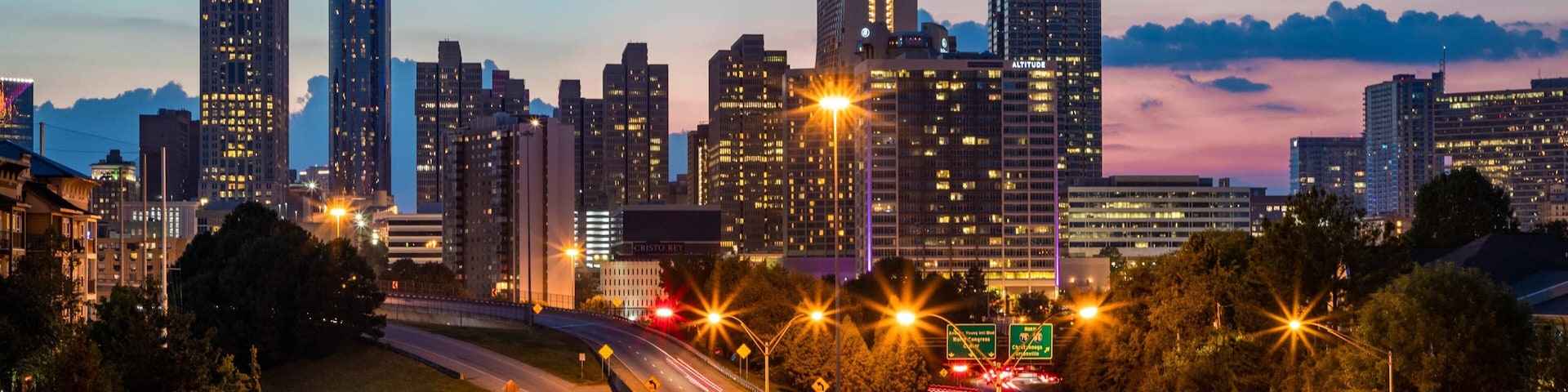 Downtown Atlanta which includes landscape views, night scenes and a sunset