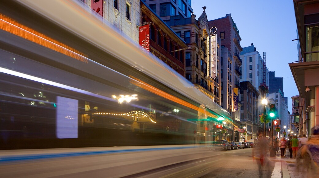 Theatre District - Downtown Crossing which includes night scenes and a city