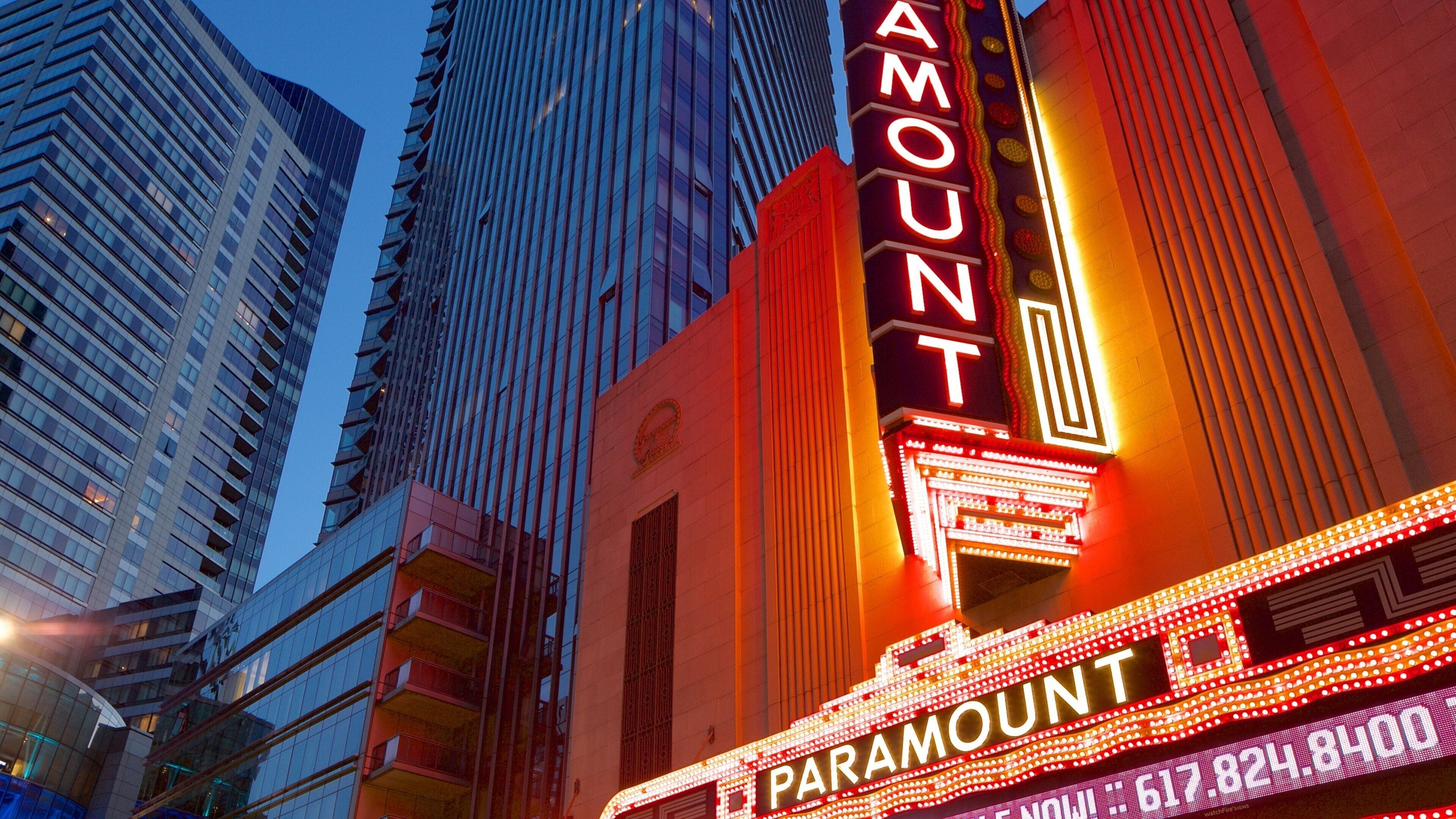 Theatre District showing a high rise building, a city and central business district