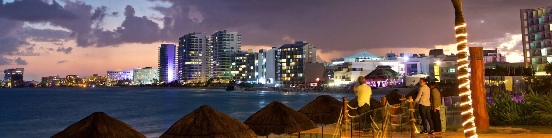 Hotel Zone showing general coastal views, a coastal town and night scenes