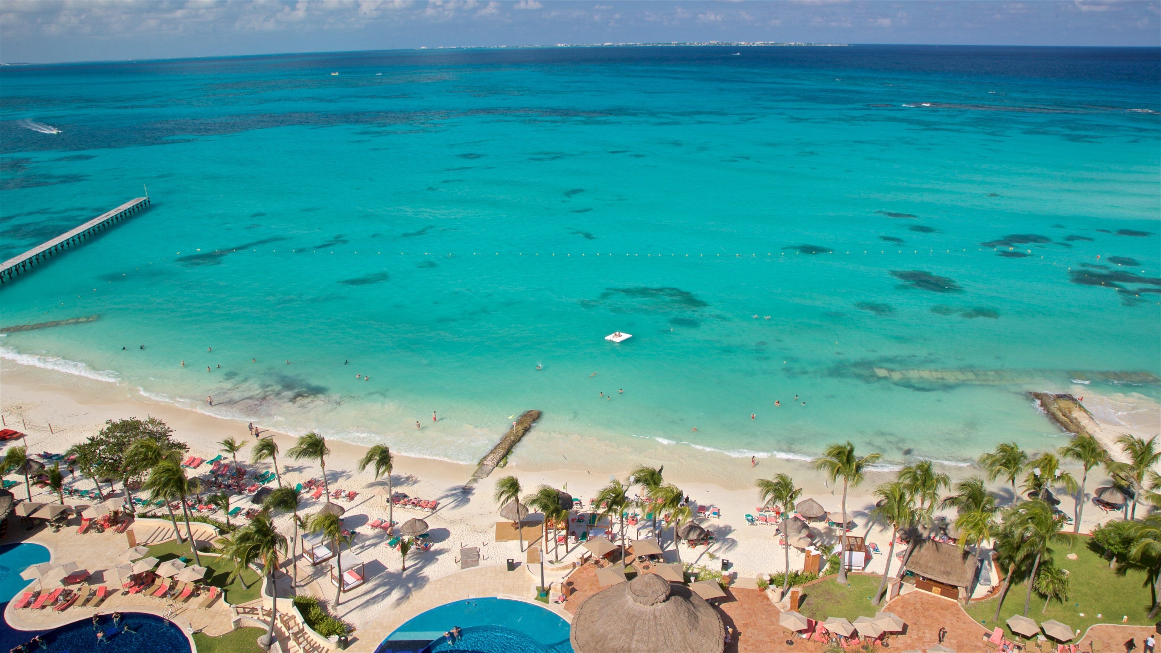 Hotel Zone showing a sandy beach, tropical scenes and general coastal views