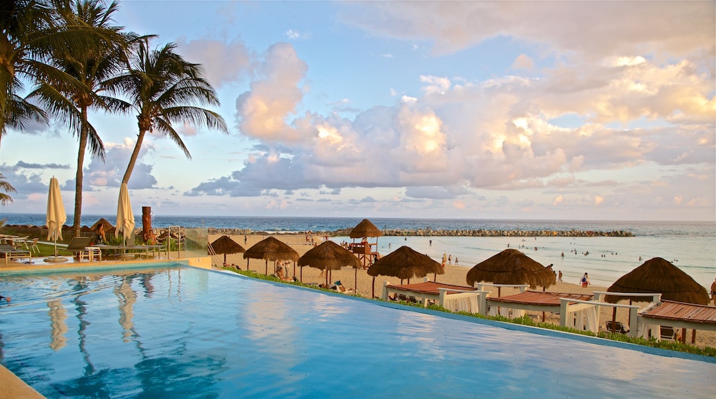 Zona Hotelera som visar kustutsikter, landskap och en solnedgång