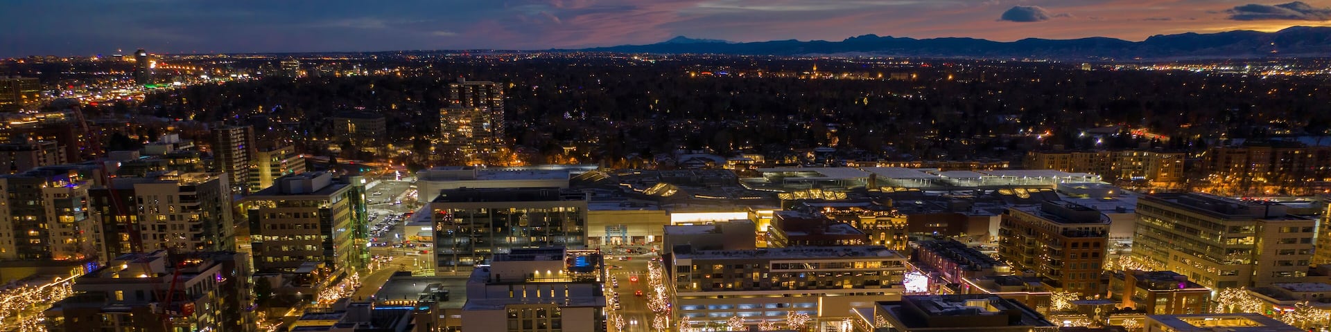 Aerial View of Cherry Creek Shopping and Dining District in the Denver Metro with Christmas Lights during the Holidays