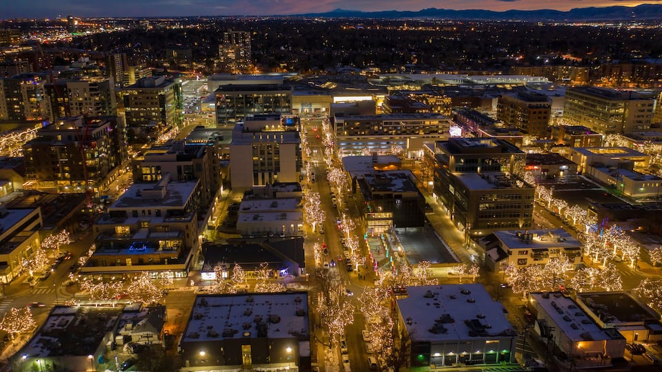 Aerial View of Cherry Creek Shopping and Dining District in the Denver Metro with Christmas Lights during the Holidays