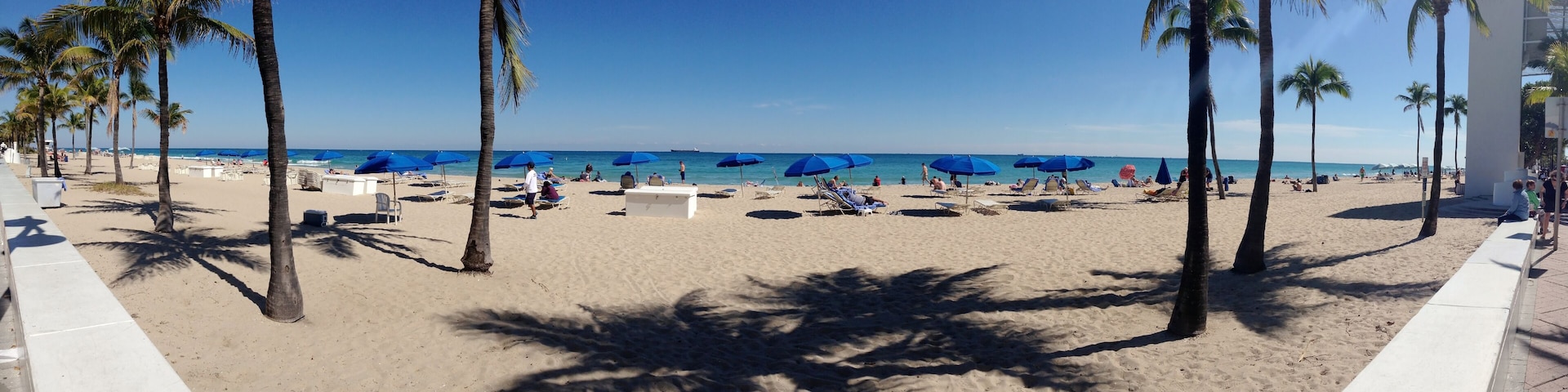 Panorama view of tourists on the beach of Fort Lauderdale, Florida, USA
