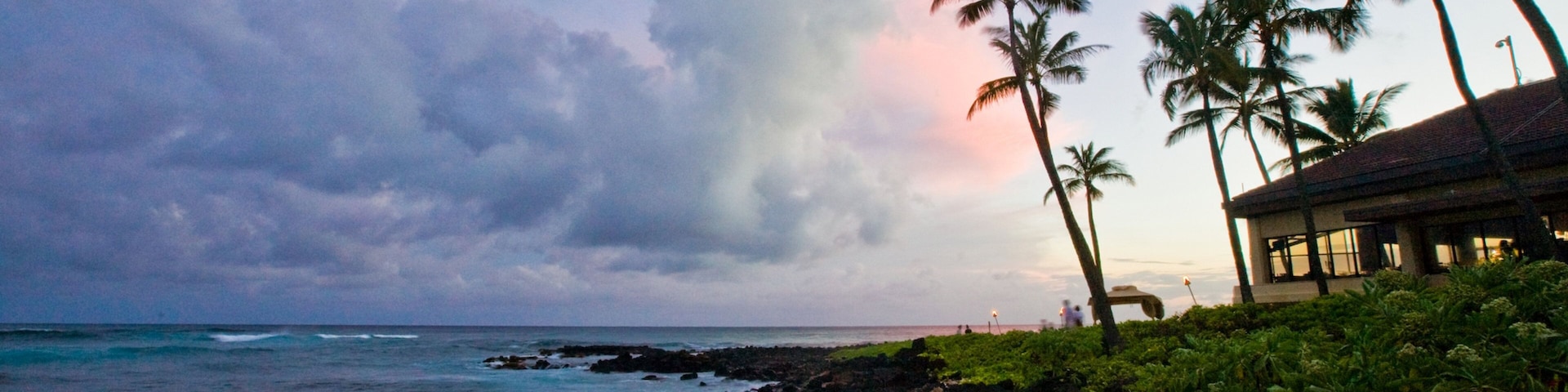 Poipu featuring tropical scenes, general coastal views and a sunset