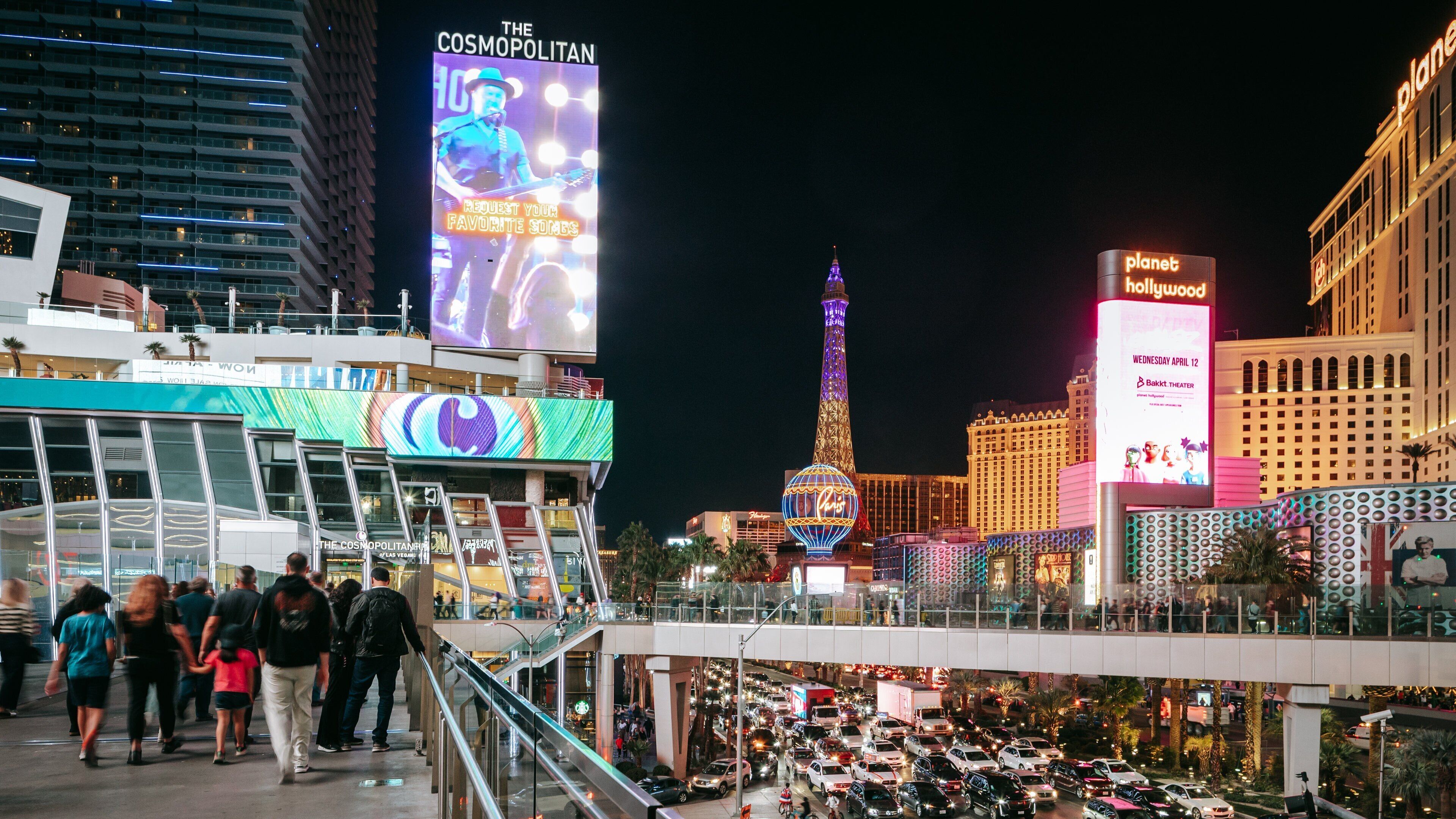 Las Vegas Strip showing a city, night scenes and street scenes