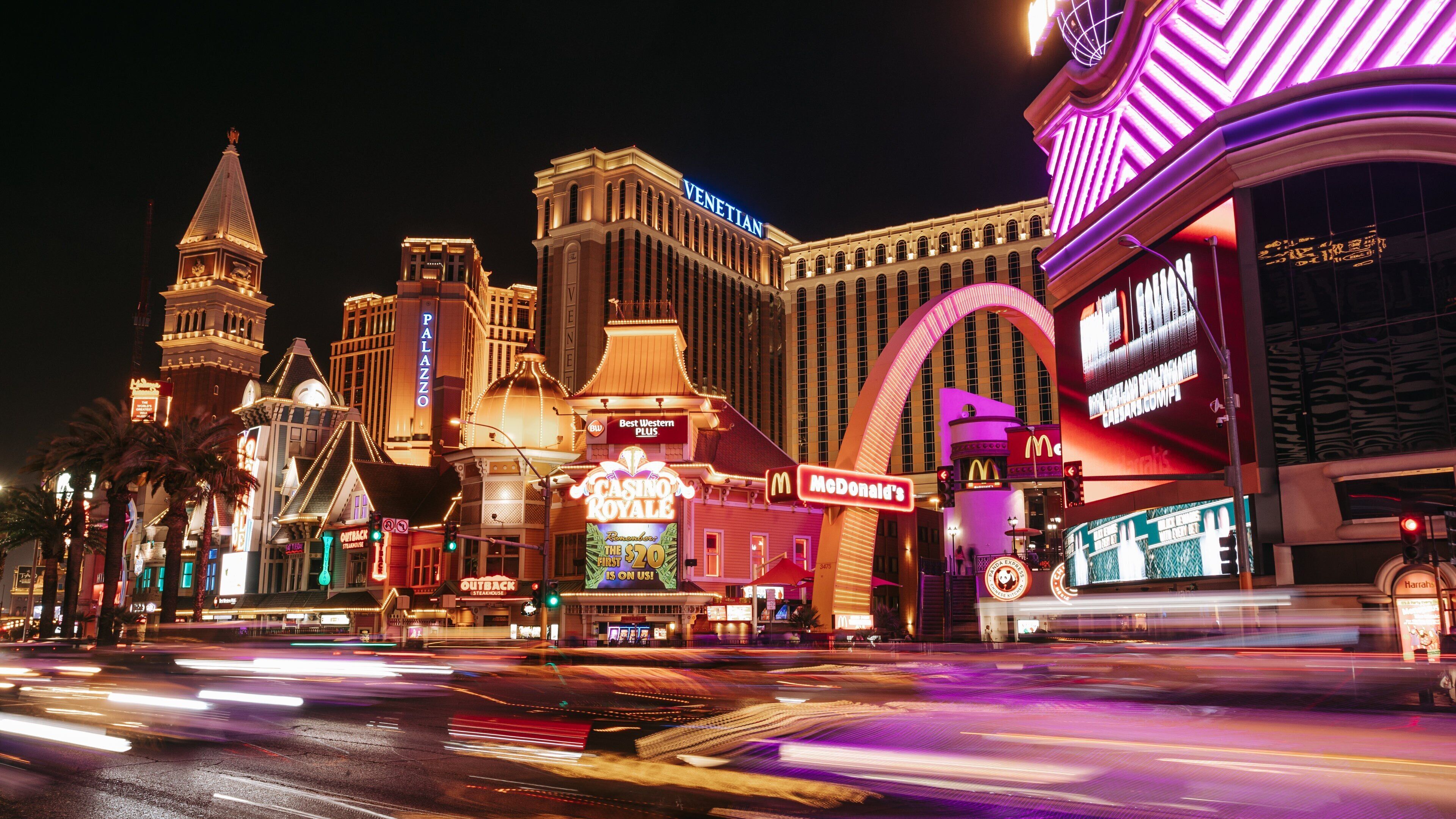 Las Vegas Strip showing signage, night scenes and a city
