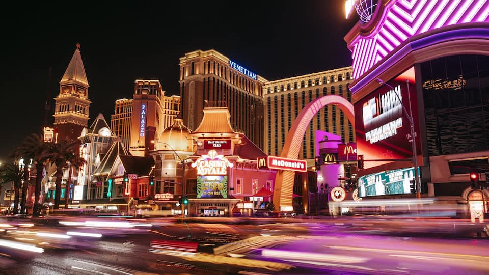 Las Vegas Strip showing signage, night scenes and a city