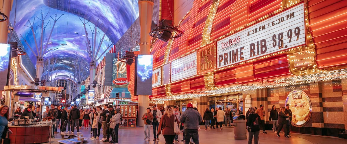 Downtown Las Vegas which includes signage, night scenes and street scenes