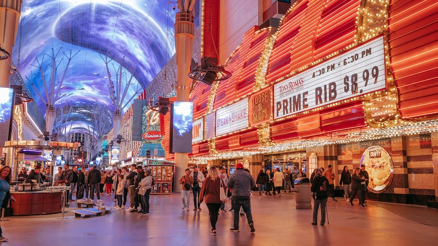 Downtown Las Vegas which includes signage, night scenes and street scenes
