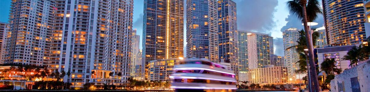 Miami showing a city, a bay or harbor and night scenes
