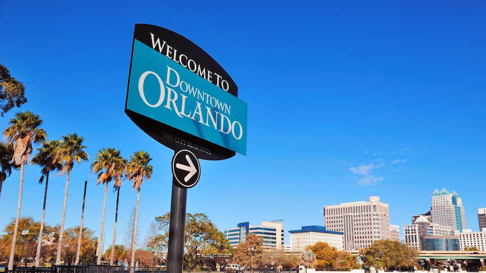 Orlando downtown welcome sign with tropical scene; Shutterstock ID 99801884