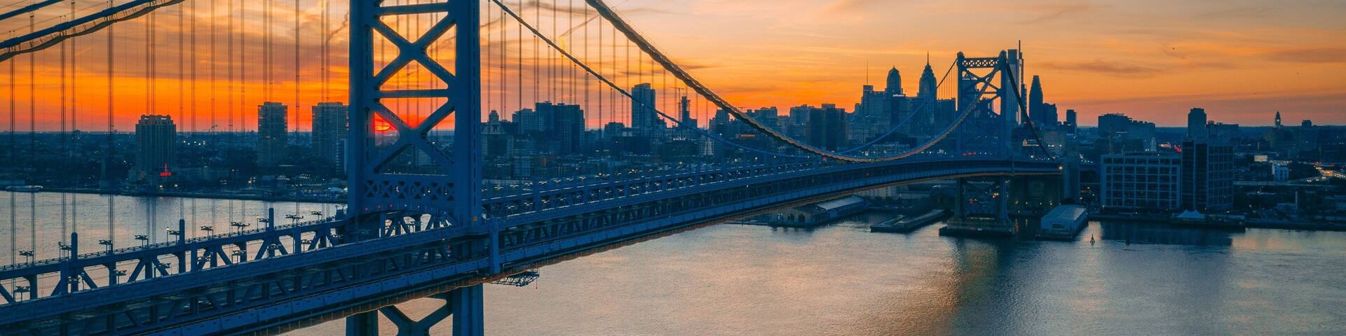 The Benjamin Franklin Bridge over the Delaware River and view of the skyline in Philadelphia, Pennsylvania