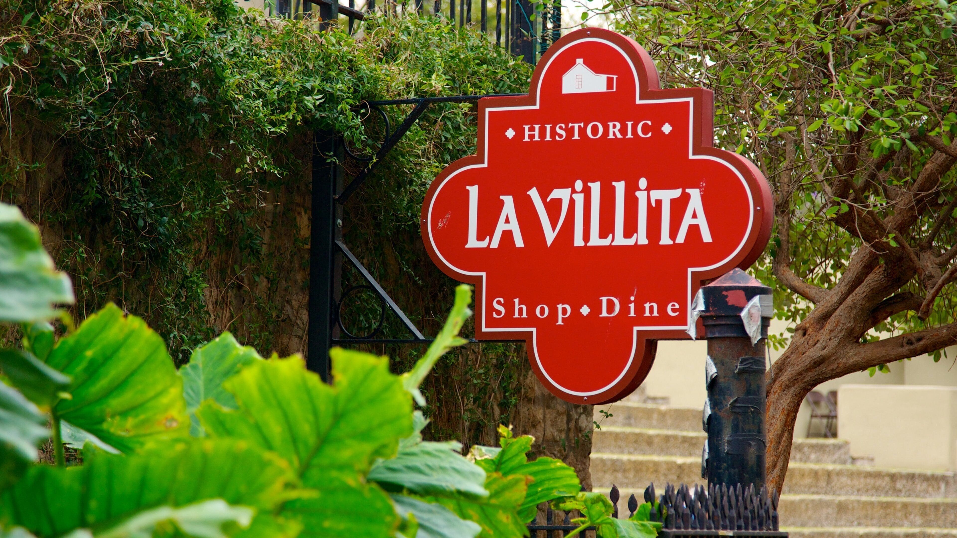 Downtown - Riverwalk featuring signage