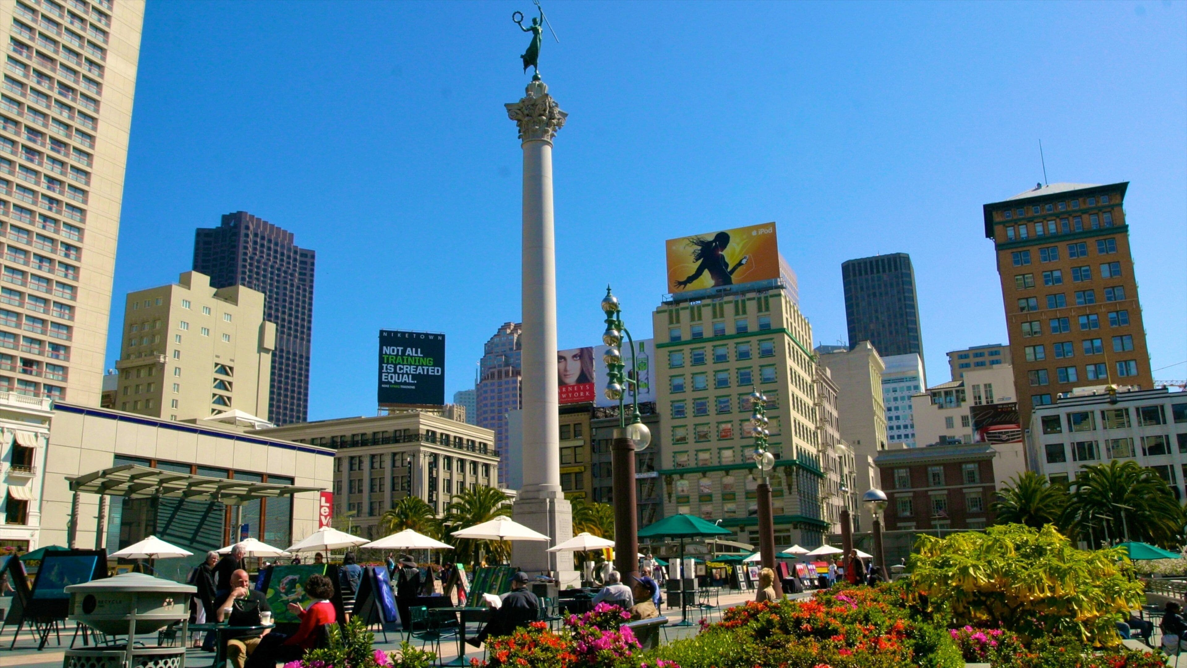 Union Square in San Francisco bustling with people and vibrant activities under a clear blue sky