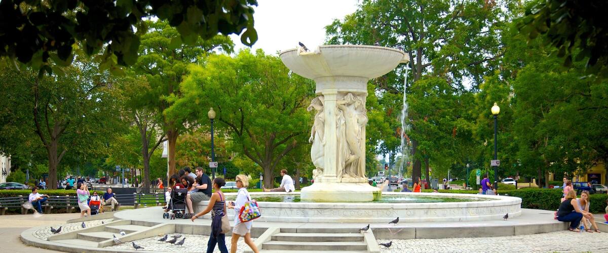 Dupont Circle featuring a park, a monument and a fountain