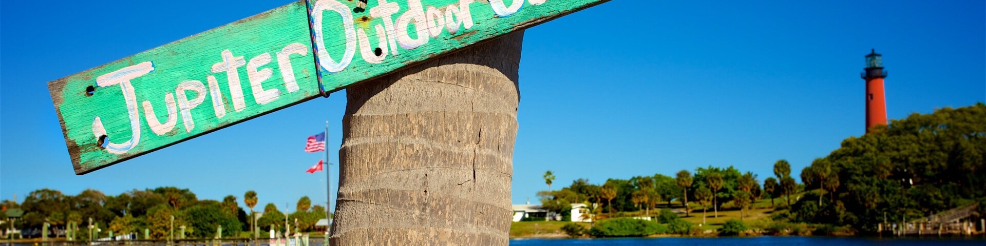 Jupiter which includes a bay or harbour and signage