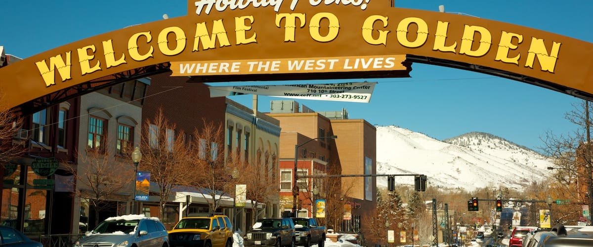 Golden which includes street scenes, signage and a city