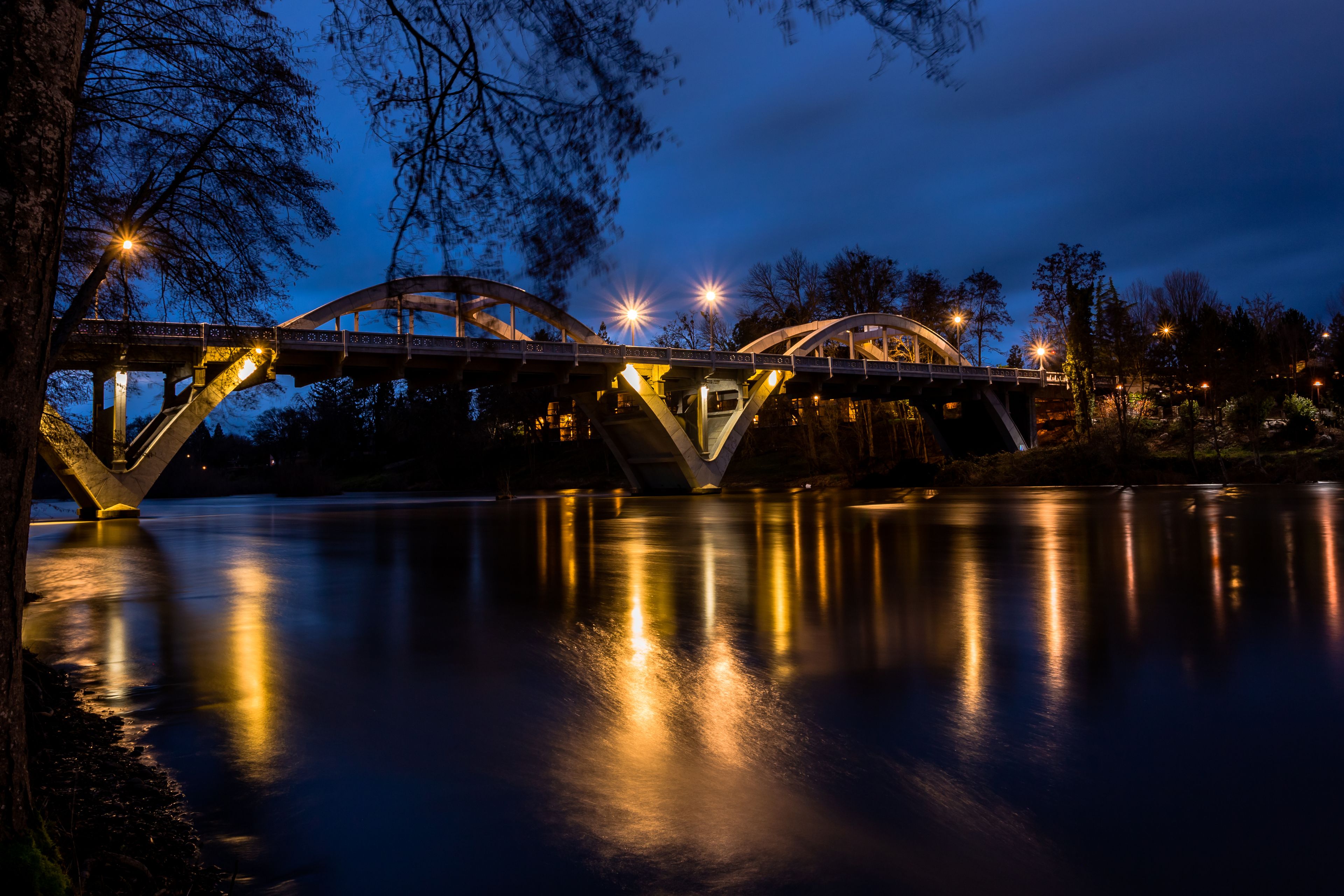 The Cavemen bridge over Rogue River in dusk in Grants Pass, Oregon