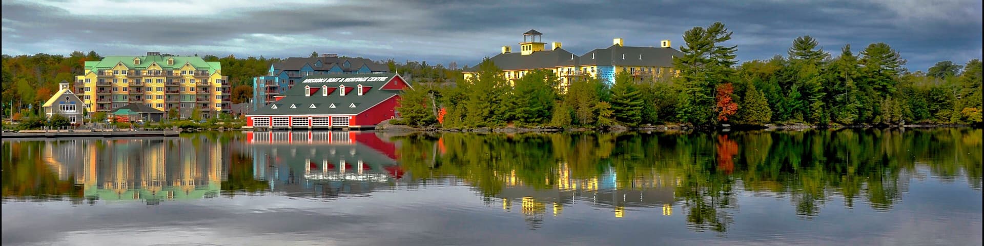 Gravenhurst, Ontario / Canada - 10/05/2008: water reflection of the buildings in the waterfront in Gravenhurst, Ontario, Canada.