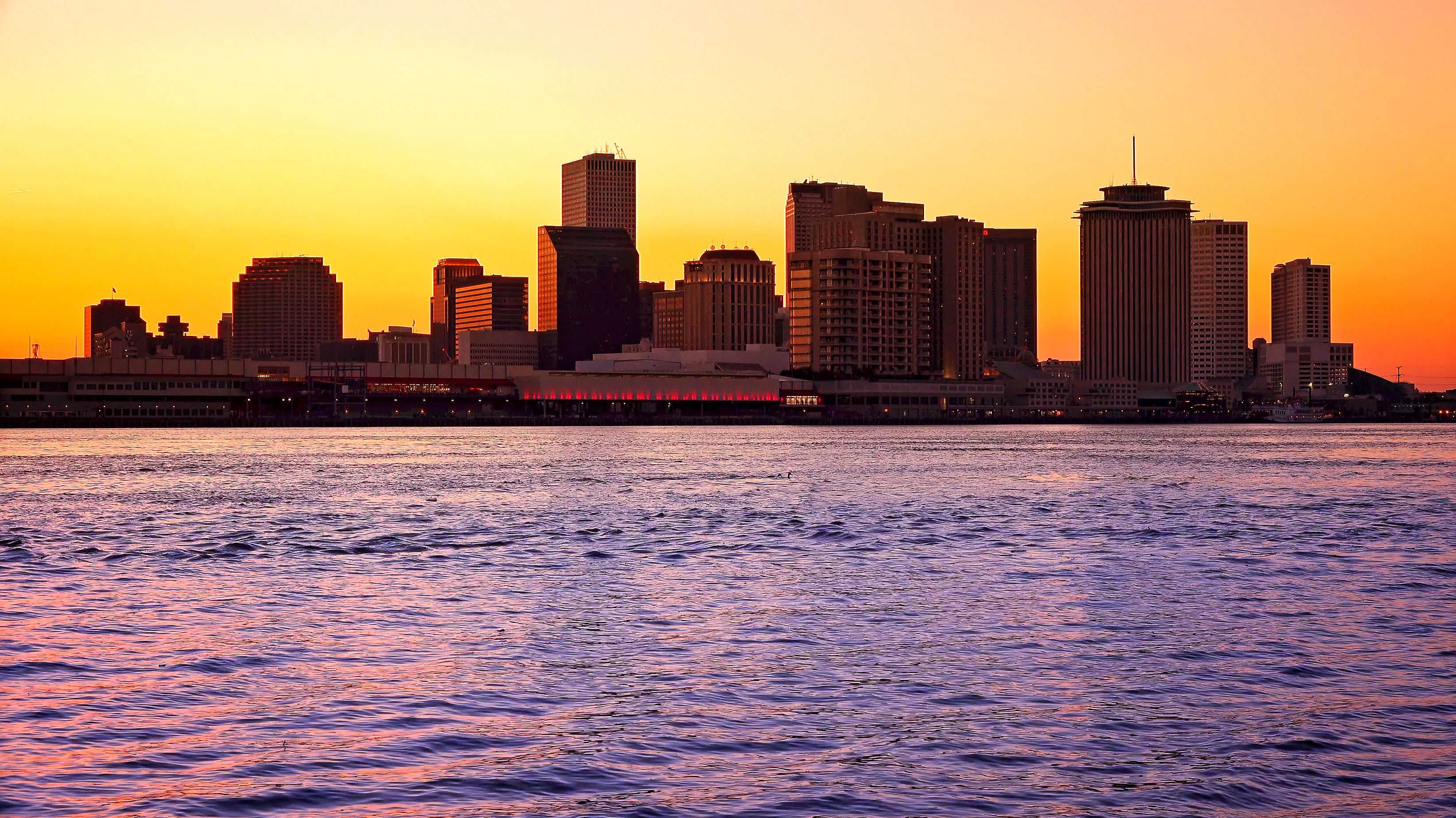 Silhouette of New Orleans City Skyline Across the Mississippi River