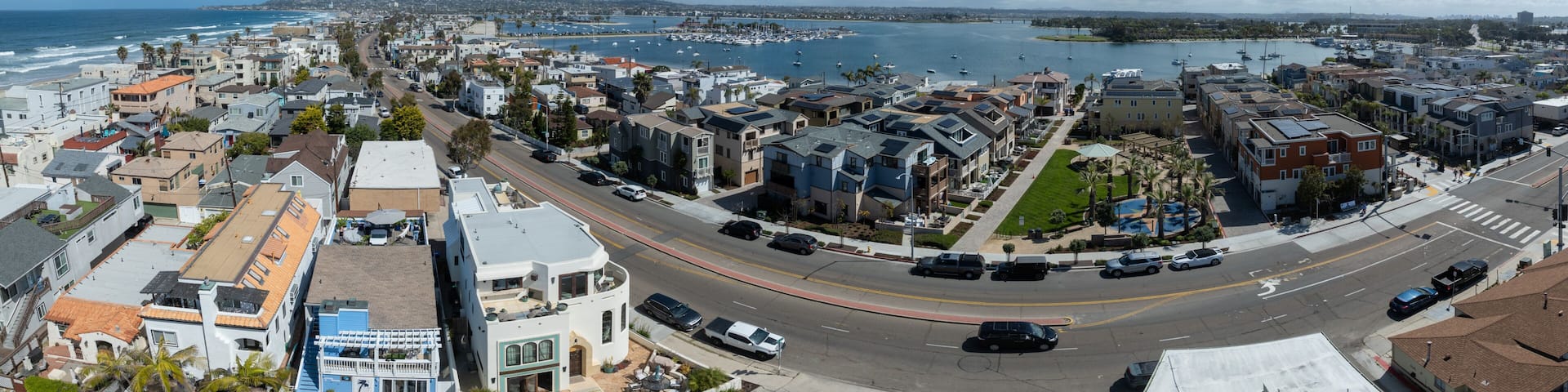 Aerial view of Mission Beach in San Diego California with sandy beach and vacation rental houses