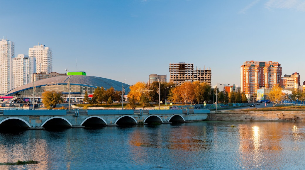 Panorama of the autumn embankment of the river Miass