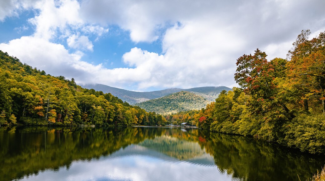 wide open landscape with lake and mountains and cloud with sky reflecting in water at vogel state park in Georgia