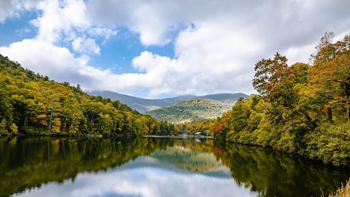 wide open landscape with lake and mountains and cloud with sky reflecting in water at vogel state park in Georgia
