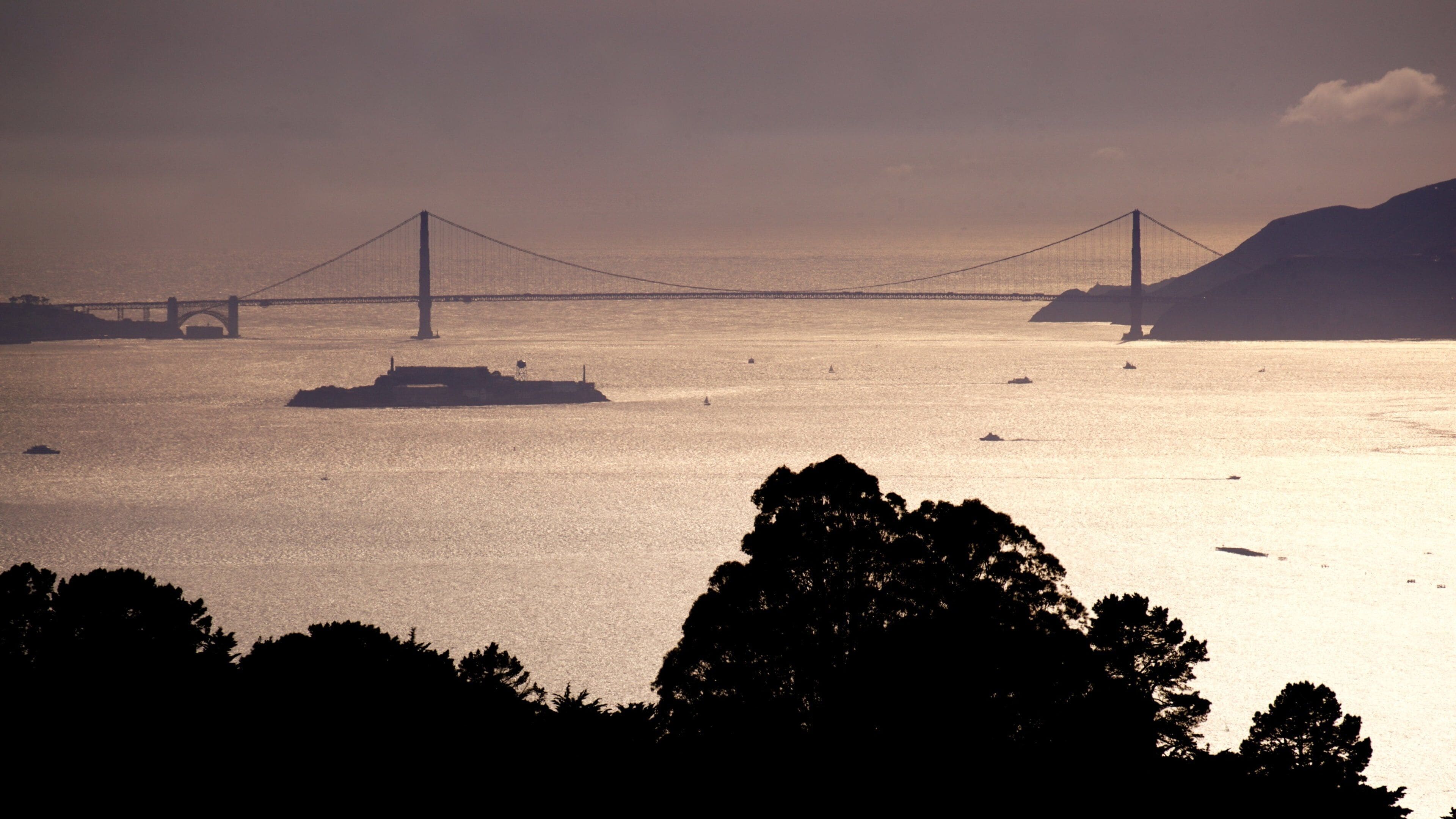 Berkeley showing a river or creek, a sunset and general coastal views