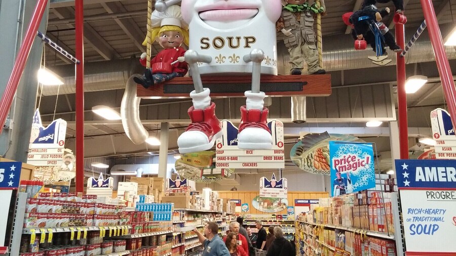 An enormous anthropomorphic can of Campbell's Soup flanked by the Campbell's Kids on a giant playground swings looms overhead. M'm! M'm! Weird!
Just one of many, many oddities that greet visitors/shoppers of Jungle Jim’s International Market, a 200,000 square feet destination grocery store!