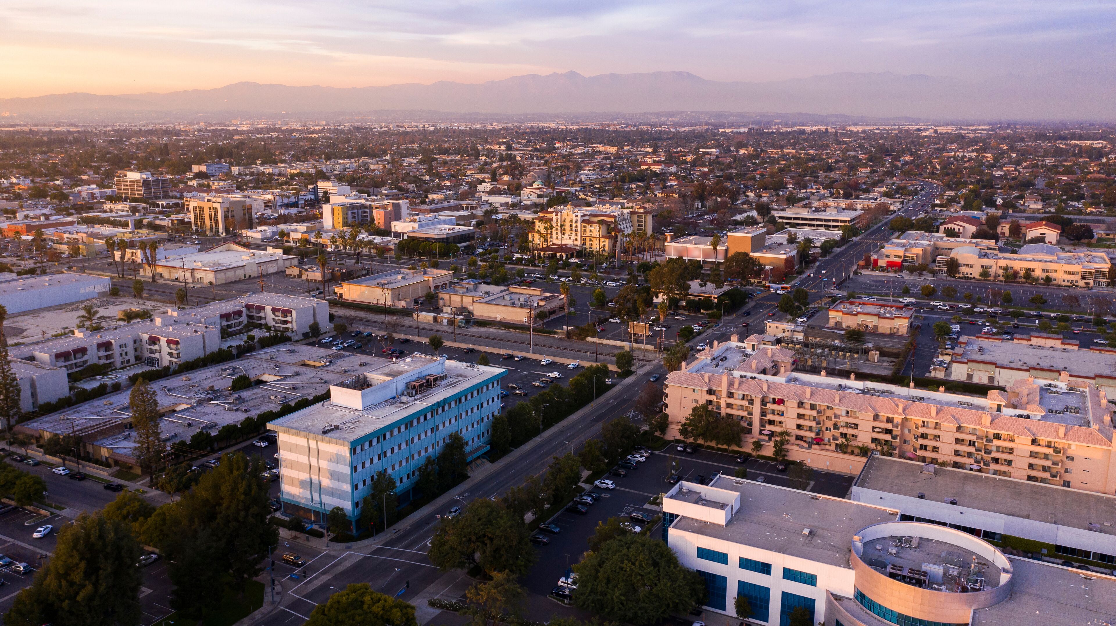 Sunset aerial view of downtown Downey, California, USA.