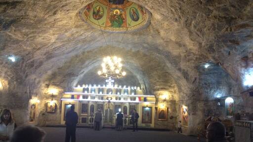 Church, 3 km and 250m down from the land !