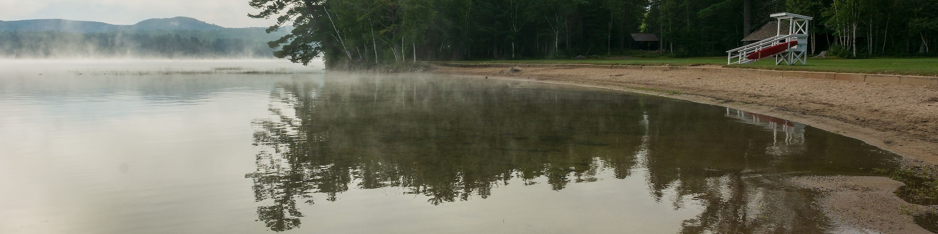 Foggy morning view of Webb Lake from Mt. Blue State Park campground