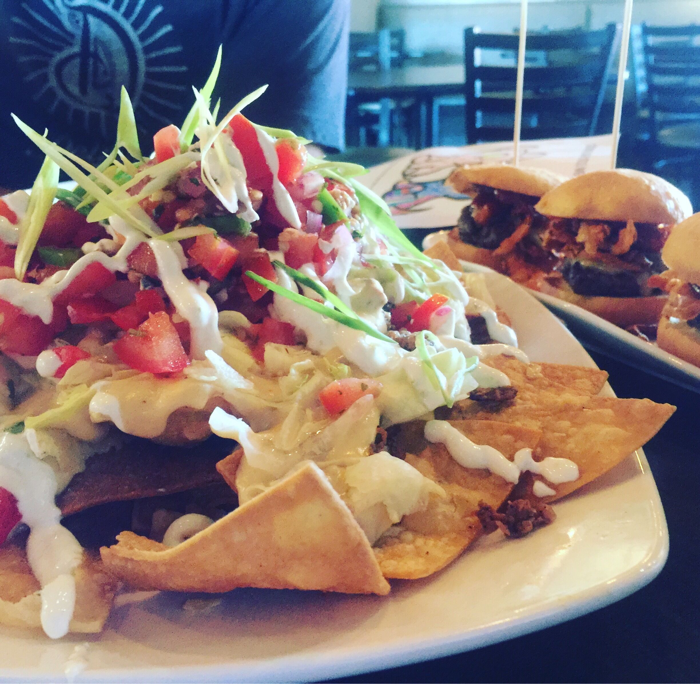 Yummy plates to share.  Shaved Ribeye Nachos & Cowboy Sliders.  The Corner Bar & Grill in Fenton is our new favorite hot spot!  Our local yocals need to check this place out. #lovemytown