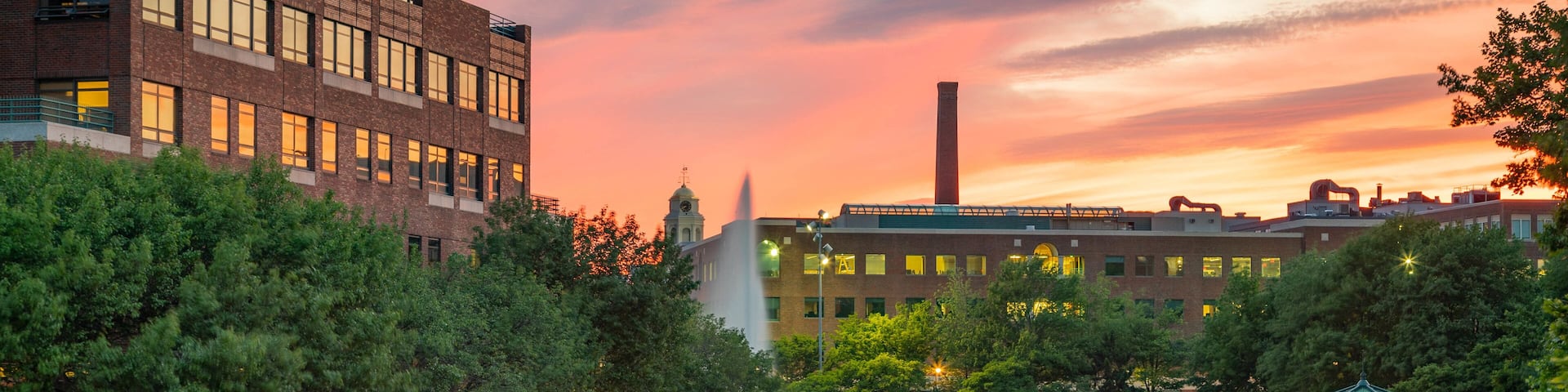 Cambridge showing a sunset and a river or creek
