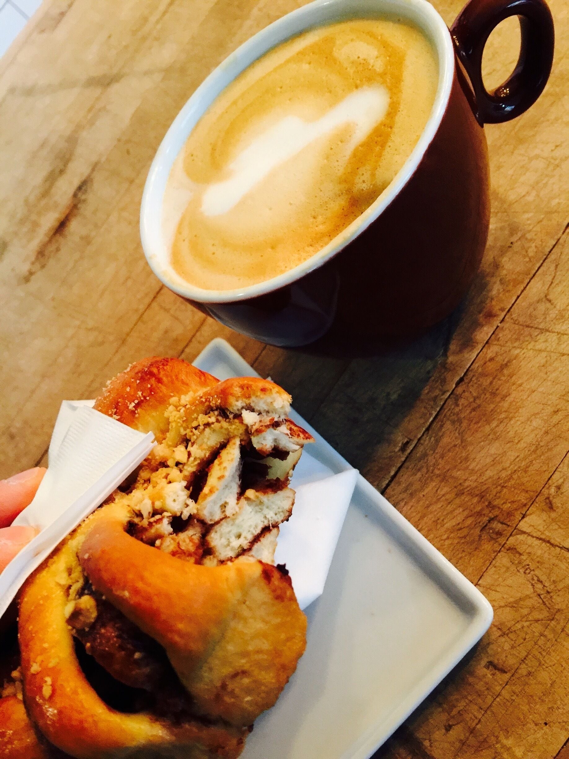 Awesome soy milk cappuccino and almond croissant! Damn yum 