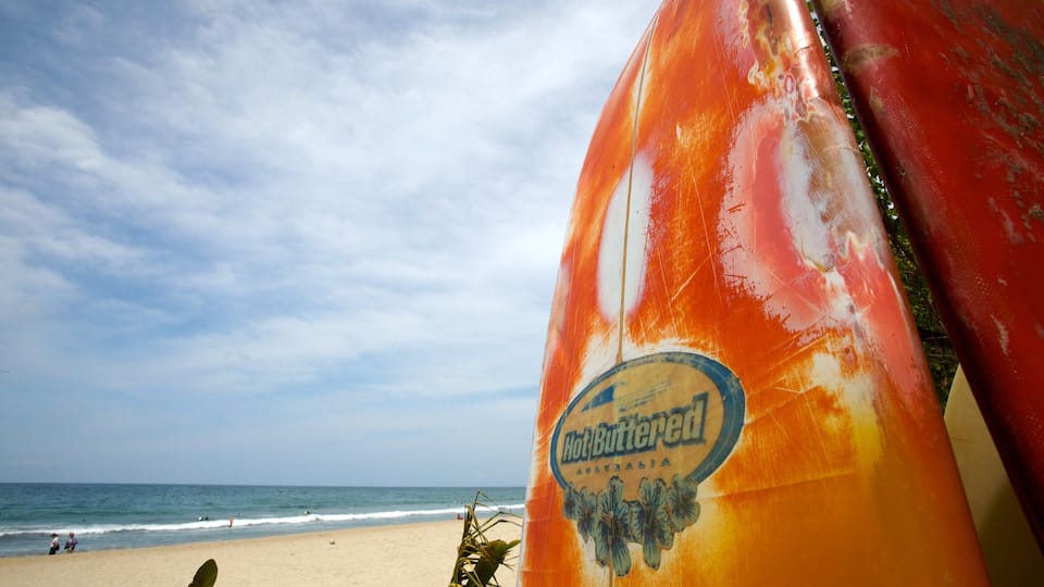 A beach with a large inflatable structure.